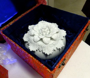 Porcelain flower form in its fine box.