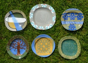 Earthenware dessert plates decorated with coloured slips.