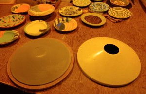 The underside of plate and lamp shade form.