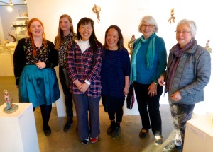 gallery staff and visitors at the opening