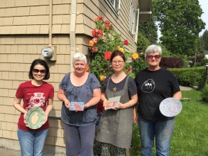 4 TriCity potters with their favourite pieces from the day